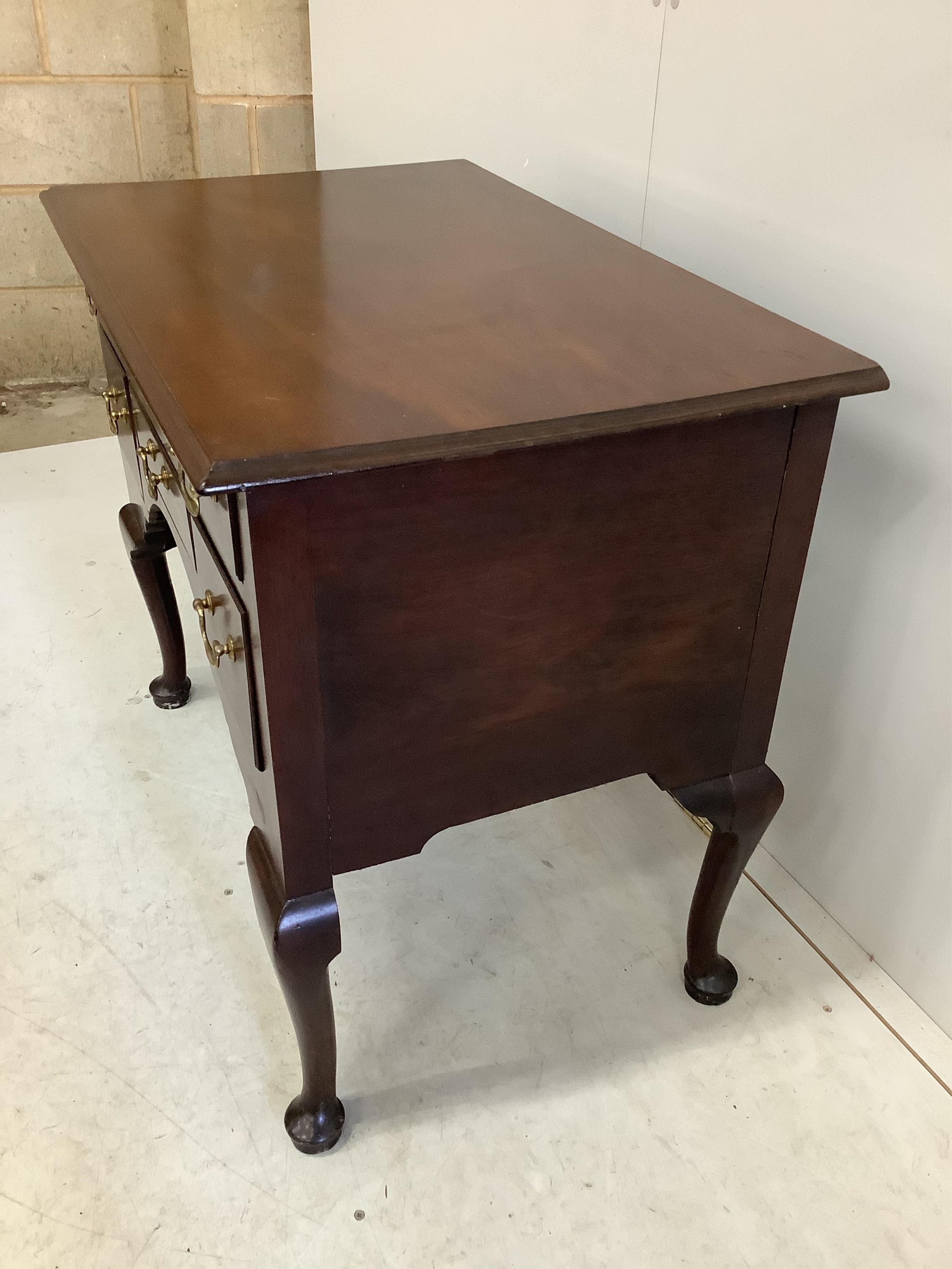 A George III mahogany lowboy, width 84cm, depth 52cm, height 71cm. Condition - fair to good